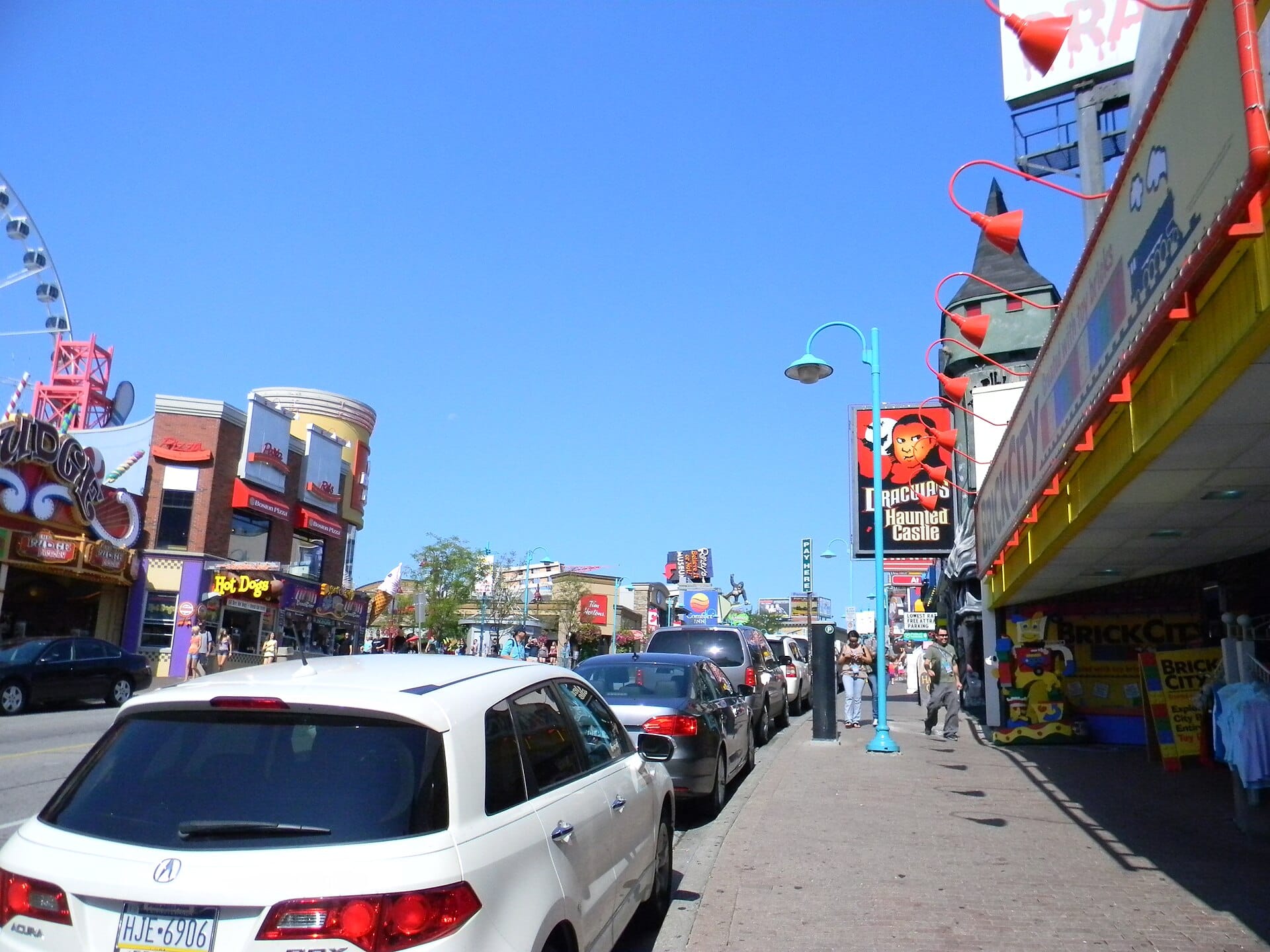 Clifton Hill looking toward the SkyWheel, with attractions along the street